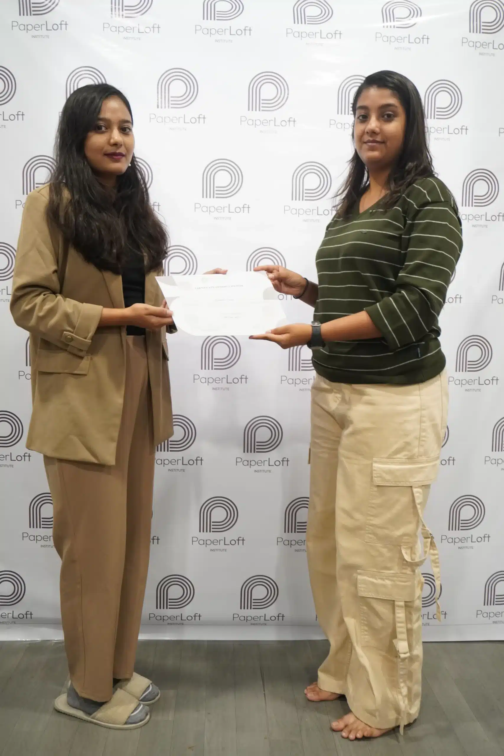 Interior design students receiving certification by Mentor of Paperloft Institute